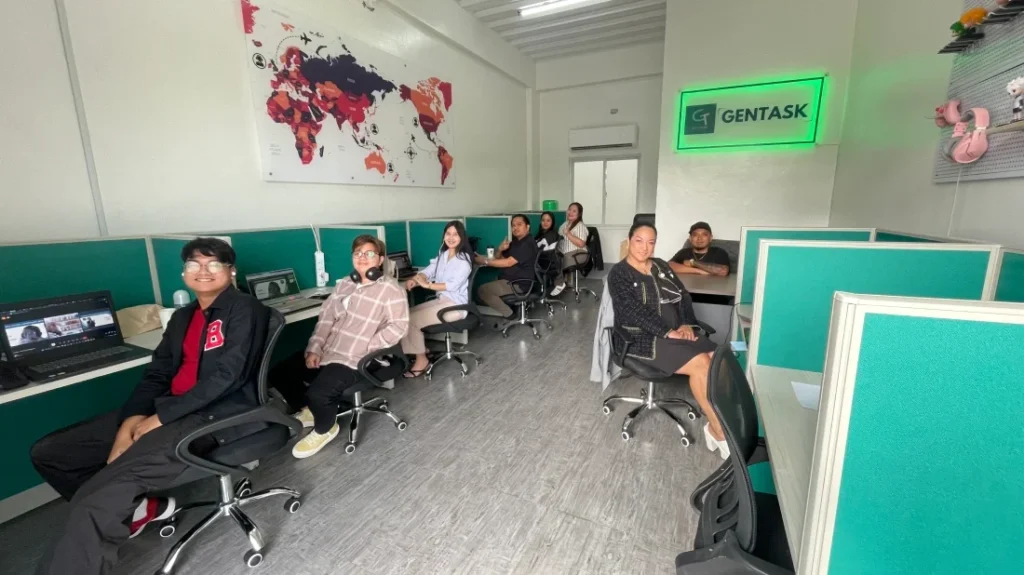 Gentask virtual assistant team working together at office cubicles